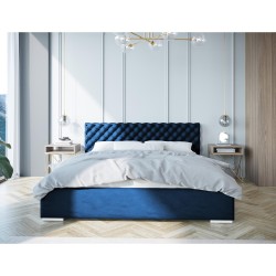 Łóżko pikowane Figgo w pokoju w kolorze niebieskim